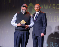 Nashville real estate broker Grant Hammond receiving the 2024 GNAR Diamond Elite Award of Excellence at the Greater Nashville Association of Realtors ceremony