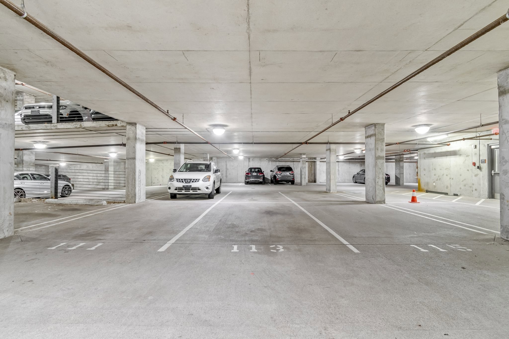 5th and Main condominium structured parking garage at 2115 Yeaman Place in East Nashville Cleveland Park district with assigned resident spaces