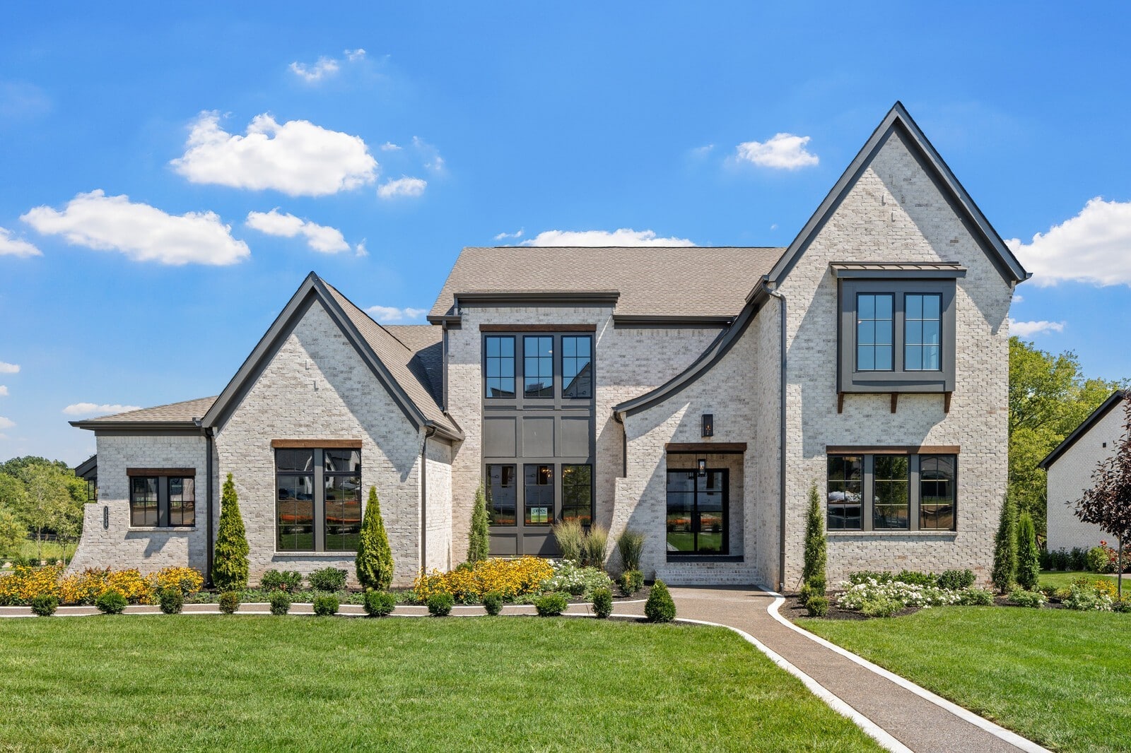 Brentwood luxury home exterior representative of the $1.5M-plus 37027 market covered in this weekly broker analysis