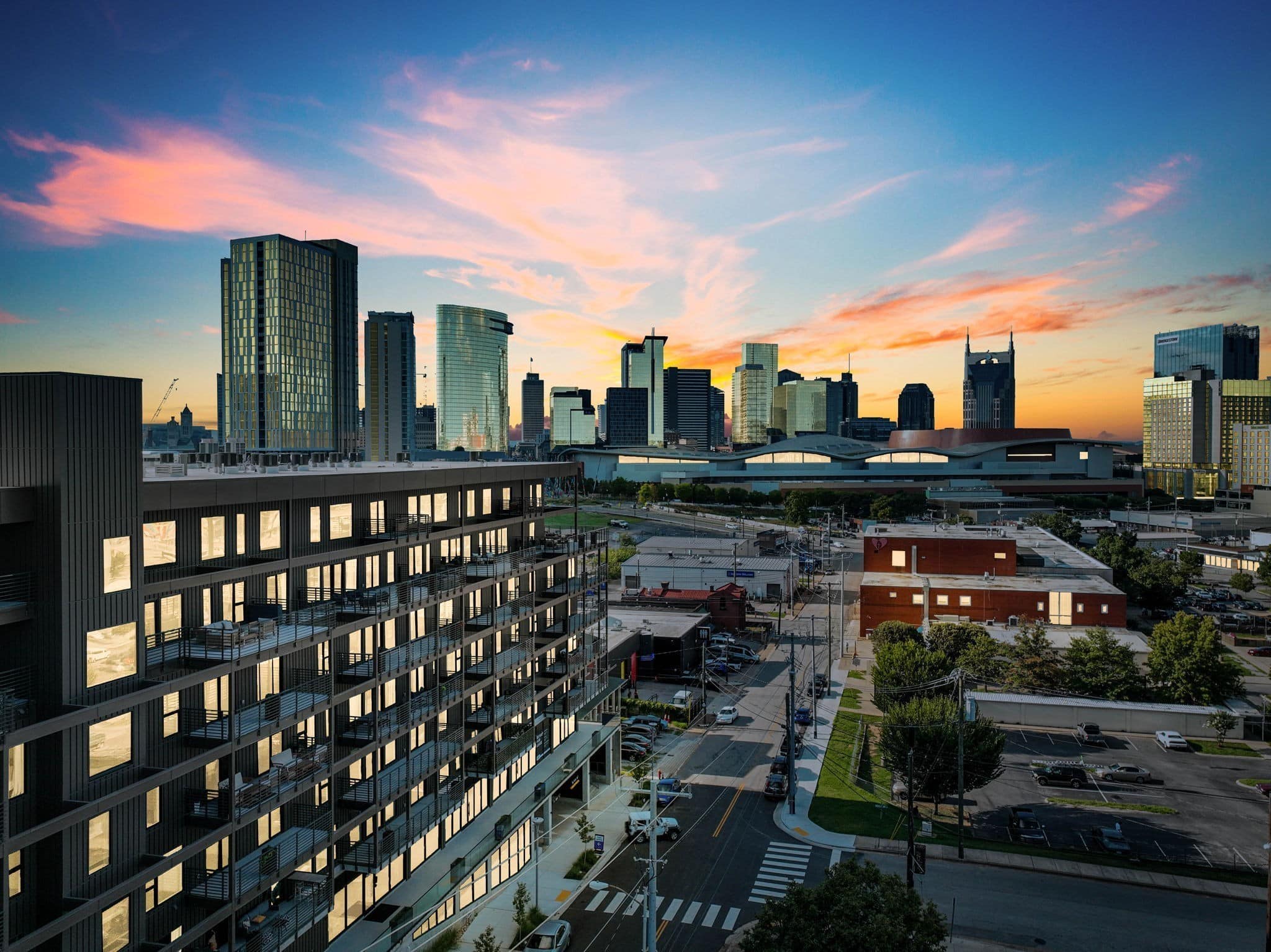 Hyve condominium at sunset at 635 7th Avenue South in Pie Town Nashville, purpose-built NOOSTR Airbnb-eligible building