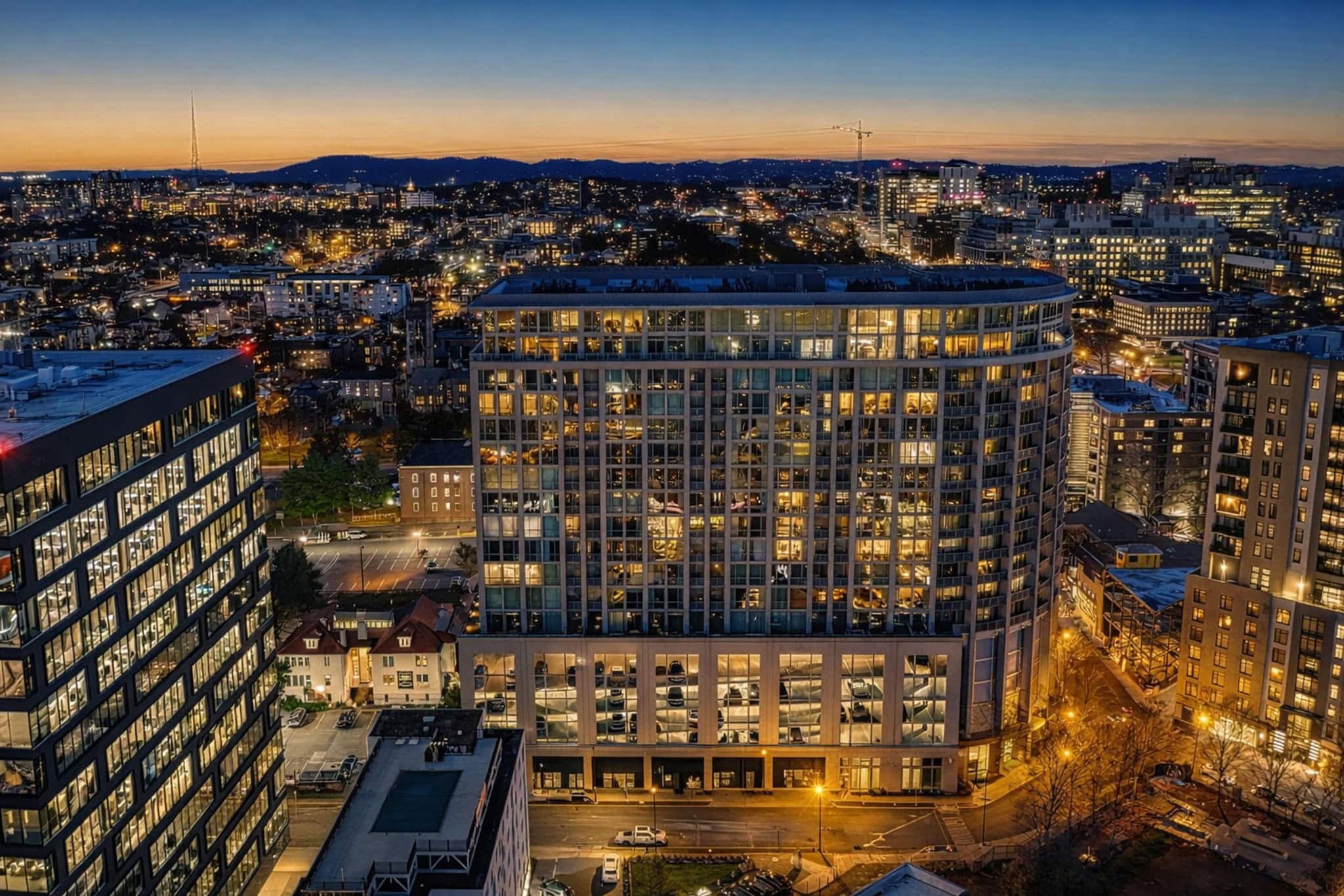 The Adelicia 391-unit two-tower luxury condominium at 900 19th Avenue South in Midtown Nashville illuminated at night, 2007 mixed-use building with eighteen residential stories