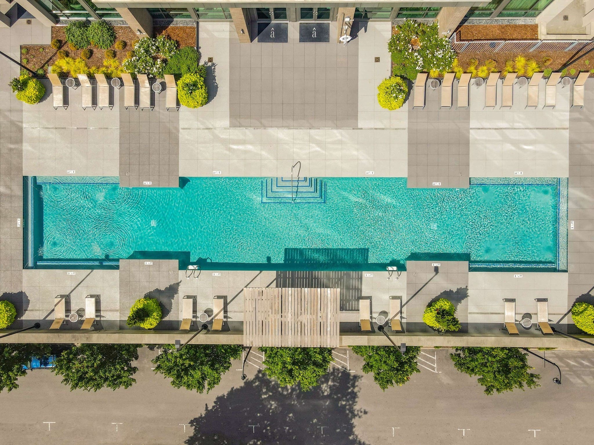 The Adelicia condominium saltwater rooftop pool and sundeck with downtown Nashville skyline views at 900 19th Avenue South in Midtown