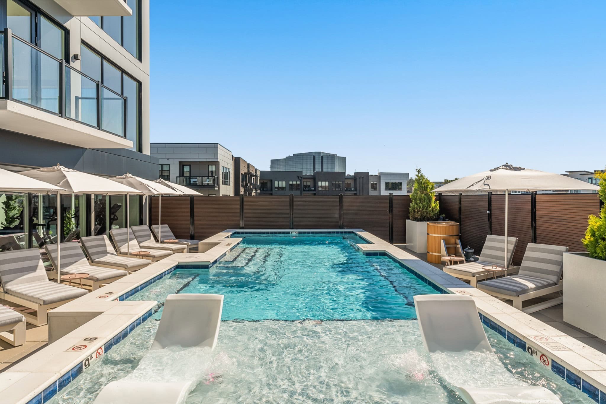 Athena at the Park rooftop pool deck and outdoor lounge with West End Nashville skyline views