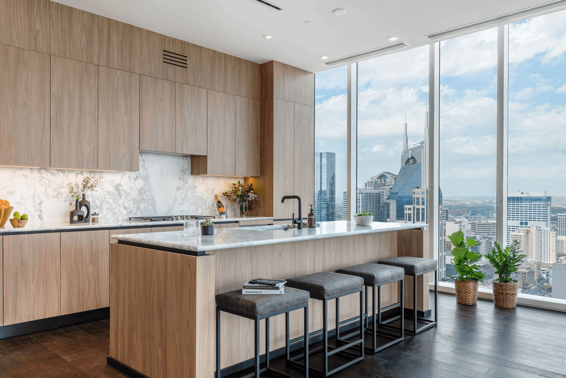 Four Seasons Private Residences condominium interior with floor-to-ceiling windows and Cumberland River views