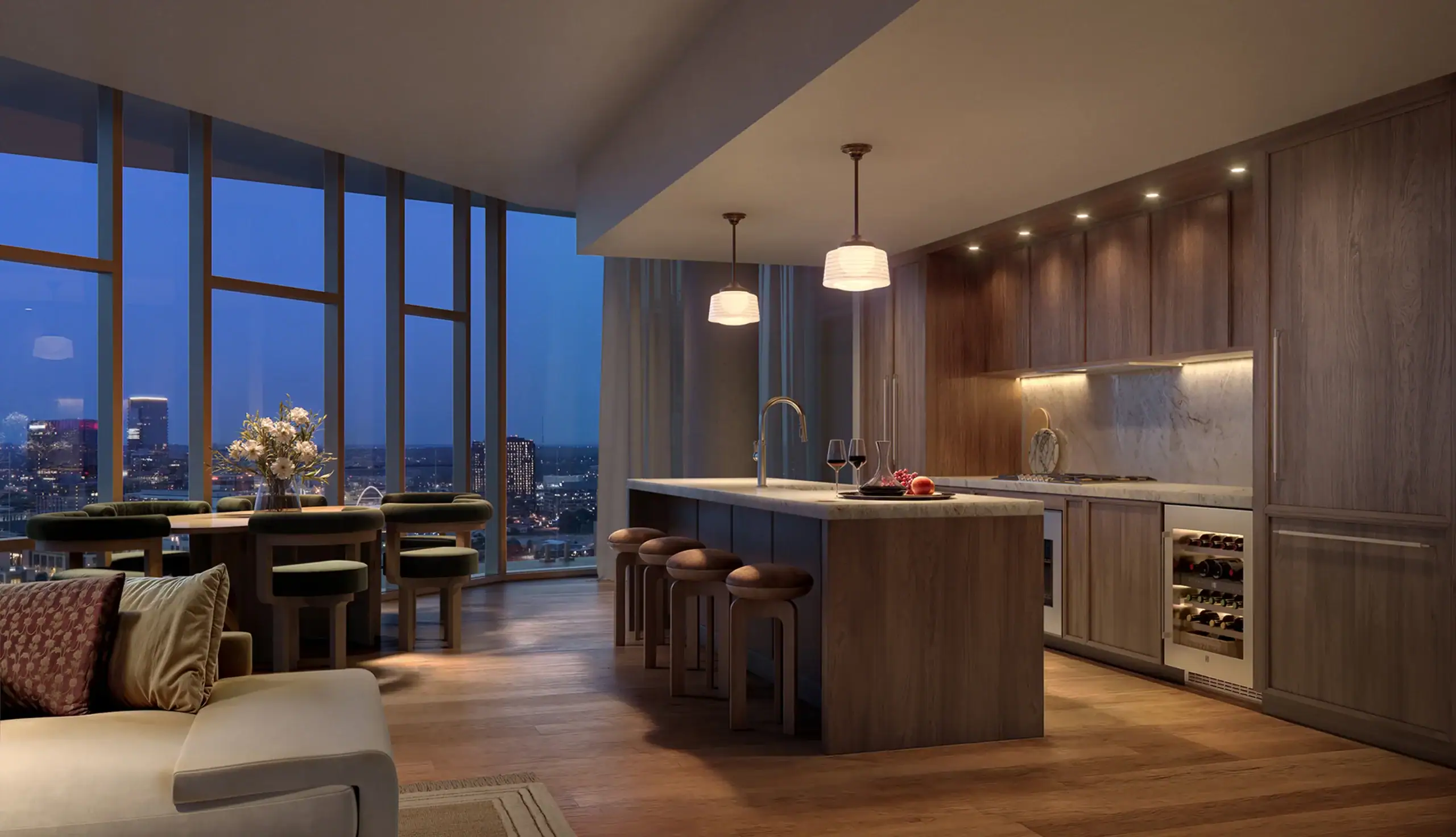 Kitchen and dining space in a Pendry Residences Nashville condominium with floor-to-ceiling windows over downtown