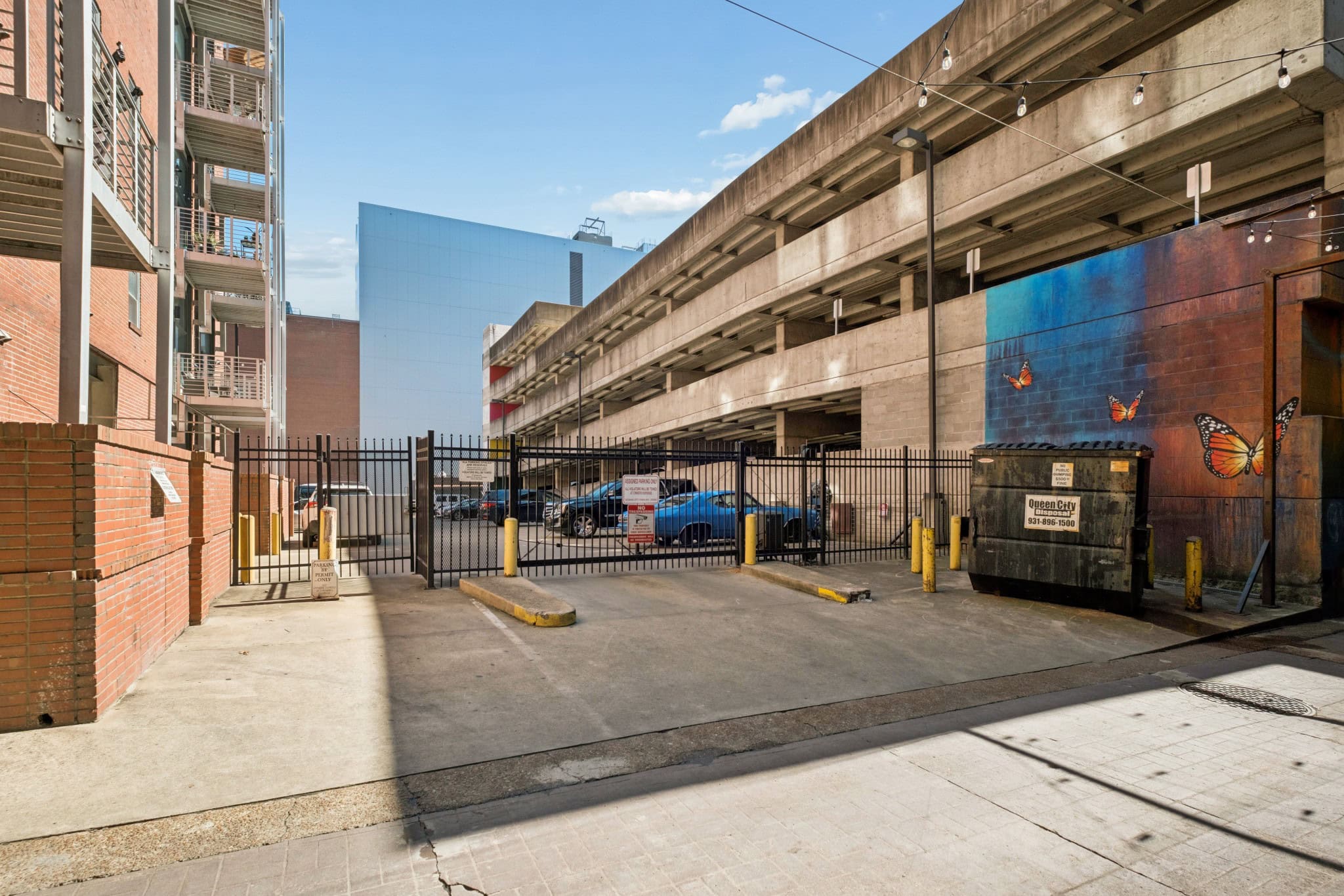 The Exchange Lofts structured parking lot at 309 Church Street in Downtown Nashville Banner Block development with assigned resident spaces