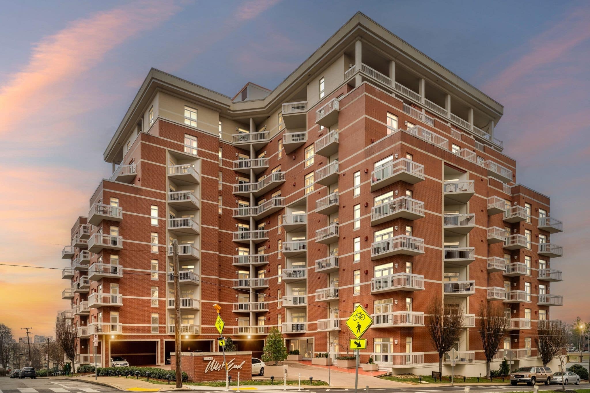 The West End ten-story luxury condominium building at 110 31st Avenue North in West End Nashville at sunset