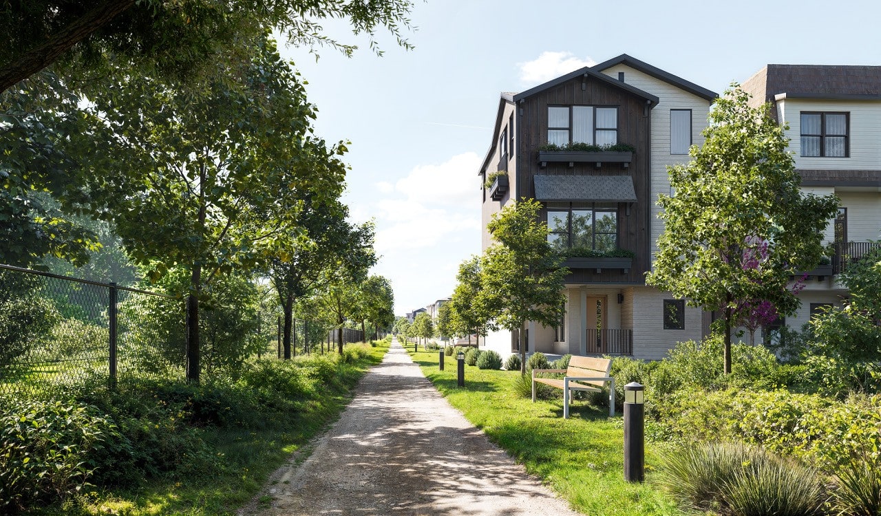 Central greenway path winding through Solaya at the Lanes townhome community in North Nashville